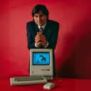 Steve Jobs and Macintosh computer, January 1984.