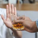 Stop alcohol concept. Person refuse to drink alcohol.