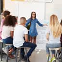 Schoolgirl presenting in front of her class