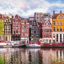 The Netherlands' canal with colorful houses and boats