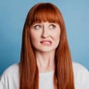 portrait of a red-head girl biting her lip, appearing guilty, isolated on a blue background