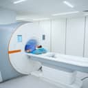 young man having a knee MRI examination in a modern medical clinic