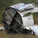 Remains of wreckage after plane crash on the ground