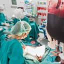 Man receives a blood transfusion during surgery