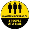 A notice showing that only three people at a time are allowed to be inside