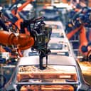 Robotic machine working on the car factory line