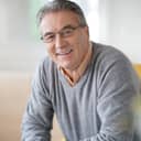 Middle aged man smiling into the camera