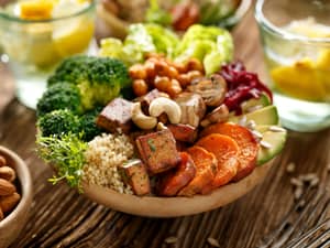 A bowl with various vegetables combined into a healthy meal