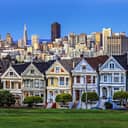 Row of houses and San Francisco skyline in the background