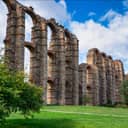 The Acueducto de los Milagros, Miraculous Aqueduct in Merida, Extremadura, Spain is a ruined Roman aqueduct bridge, part of the aqueduct built to supply water to the Roman colony of Emerita Augusta