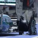 close-up of the puncture of the left rear wheel on Lewis Hamilton's Mercedes during the race, 2013.