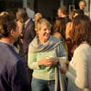 a group of people socializing at a networking event