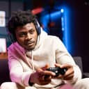 Avid gamer enjoying a console game.