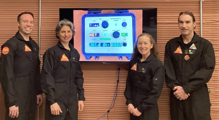 The four volunteers crew members who spent more than 12 months inside NASA's first simulated Mars environment at Johnson Space Center in Houston.