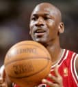 Michael Jordan as Chicago Bulls player holding a basketball