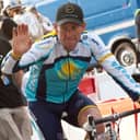 Lance Armstrong on a bicycle.