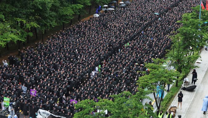 Members of the National Samsung Electronics Union gather during a rally outside of Samsung Electronics' Hwaseong campus in Hwaseong, South Korea, Monday, July 8, 2024. 