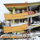 Exterior of a residence building destroyed by an earthquake