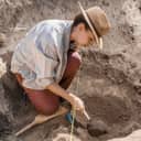 Archaeologist working on a site