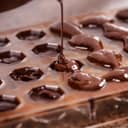 Pouring chocolate into a mould
