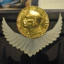 Nobel Peace Prize medal awarded to Rigoberta Menchú, on display at the Templo Mayor Museum in Mexico City