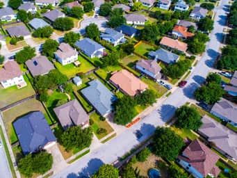 Rows of colorful houses in an American suburb.