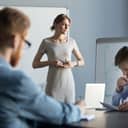 Stressed business woman leader executive in tension feels worried thinking
