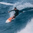 Surfer riding a wave