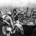 French troops advancing out of their trench towards the battlefield during the Battle of Verdun in 1916.