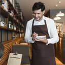 A waiter taking an order