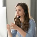 Serious call center operator talking to a customer