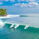 Group of surfers at Suluban Beach, Bali, Indonesia.