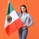 Smiling woman spreading the flag of Mexico