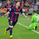Lionel Messi scoring a goal as Barcelona player