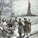 Vintage drawing of people arriving to USA on a boat. Statue of Liberty can be seen in the background