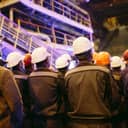 Employees in the heavy industry sector participating in a labor strike.