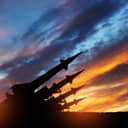 The missiles are aimed at the sky at sunset. Nuclear bomb, chemical weapons, missile defense, a system of salvo fire