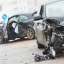 Two vehicles damaged in a car crash