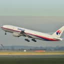 Malaysia Airlines Boeing 777-200ER (9M-MRO) ascending from Charles de Gaulle Airport in France