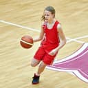 A girl basketball player in a match