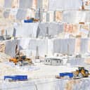 A marble quarry showcasing the extraction and processing of white marble.