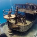 Wreckage of a boat at the bottom of the seafloor