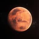 red surface of the planet Mars, also known as the Red Planet