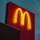 Close-up of a brightly illuminated McDonald's sign.