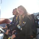 A group of young people going scuba diving