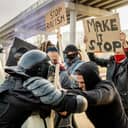 Protestors clashing with riot police