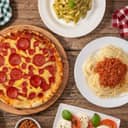 Selection of Italian dishes on a wooden table