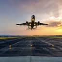 An airplane taking off a runway