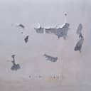 close-up of a white wall peeling