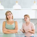 distressed daughter trying to convince her mother to go to a party